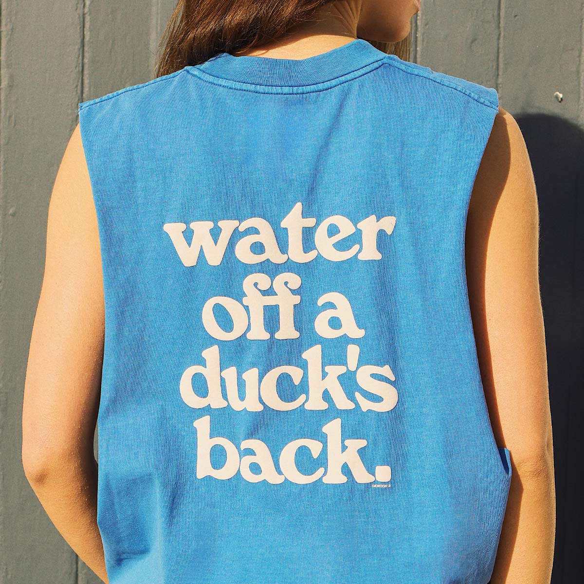 Ducks Back Slang Muscle Tank in Blue