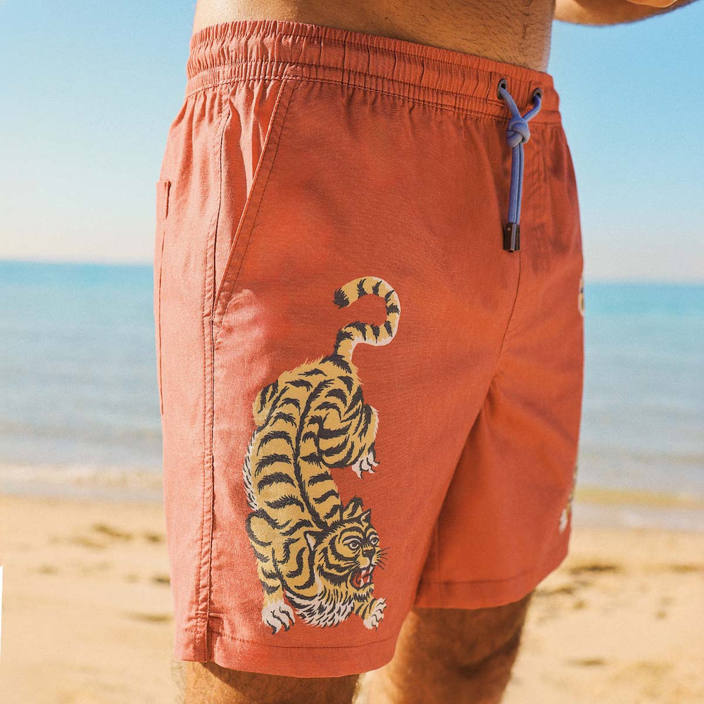Side view of the burgundy Easy Tiger shorts showing the tiger print